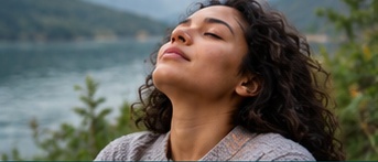 A person pausing by a landscape